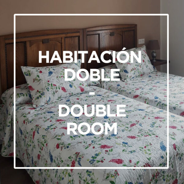 Habitación doble con baño y TV